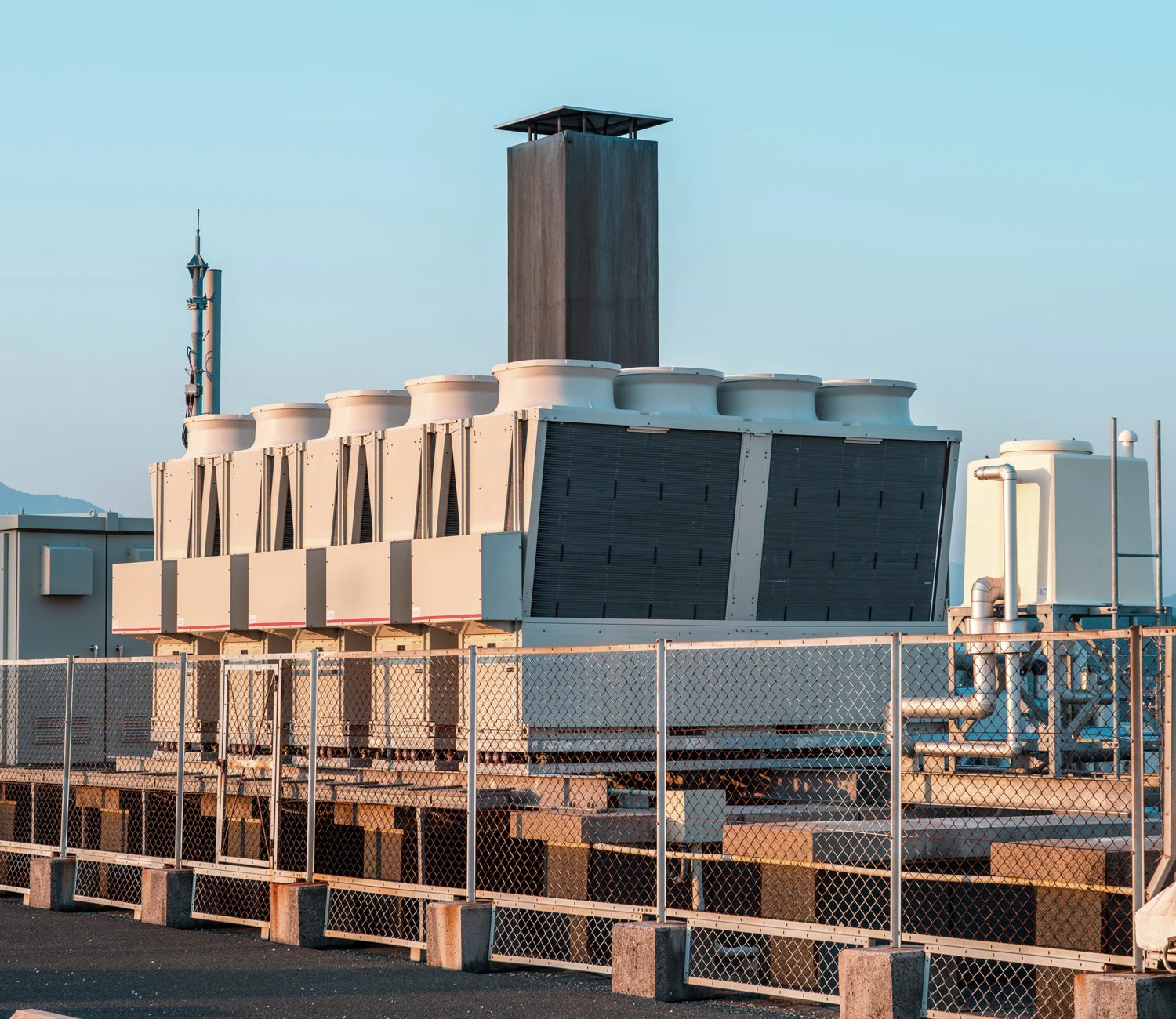 Commercial rooftop HVAC system engineered for optimal refrigerant performance in large-scale cooling