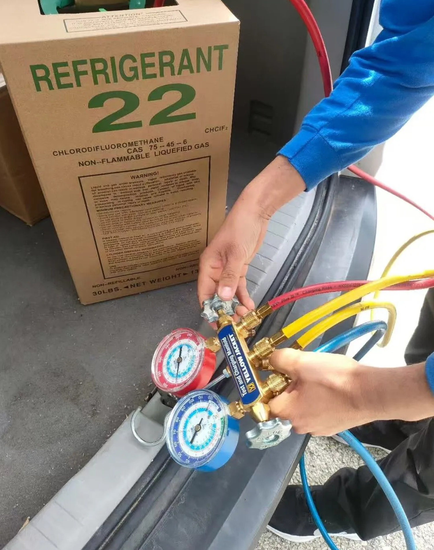 R22 refrigerant recharge process with HVAC manifold gauge set for air conditioner maintenance